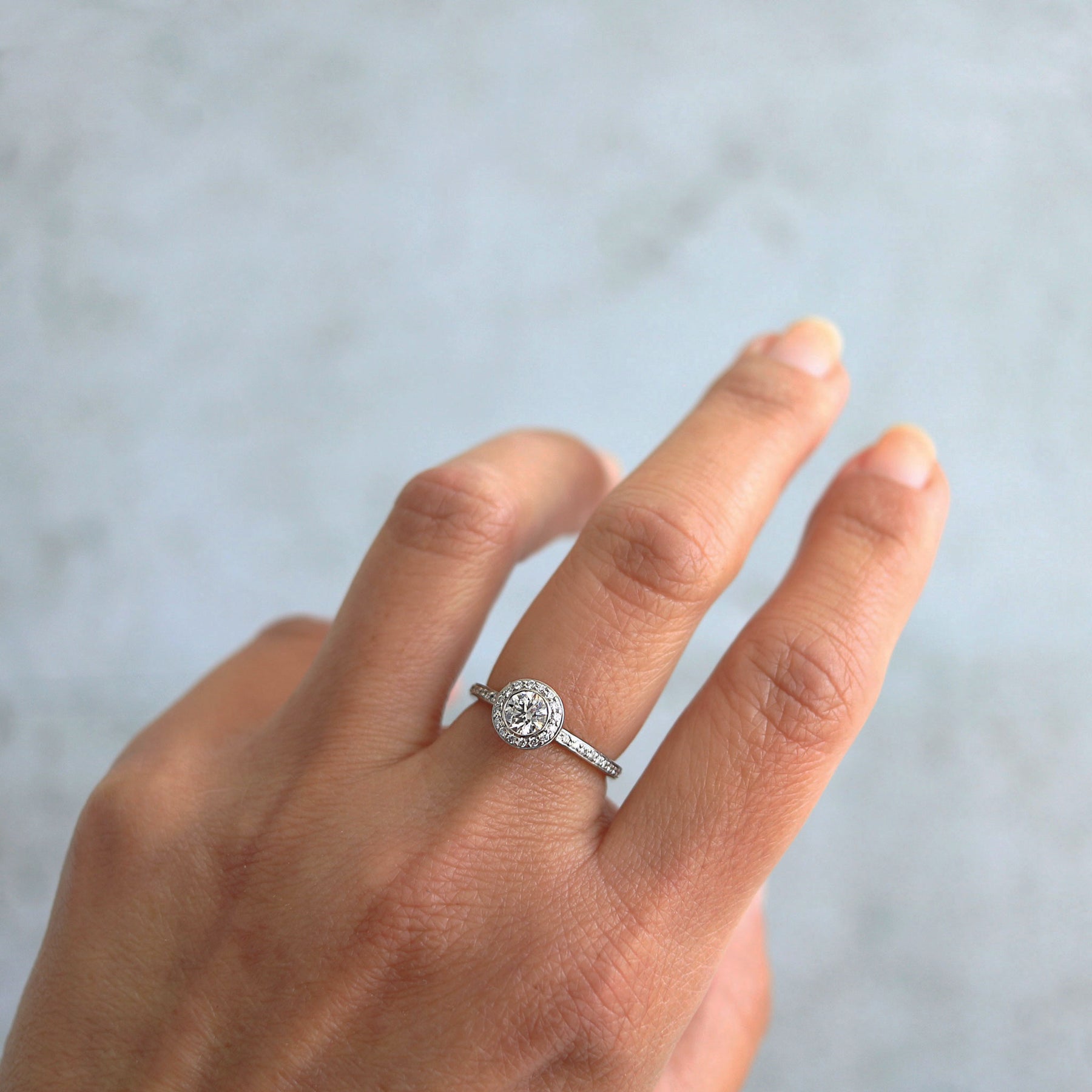 0.76ctw Diamond Halo Engagement Ring