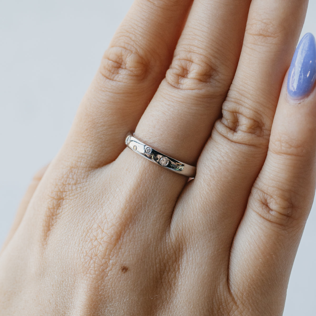 Platinum Four Stone Diamond Band