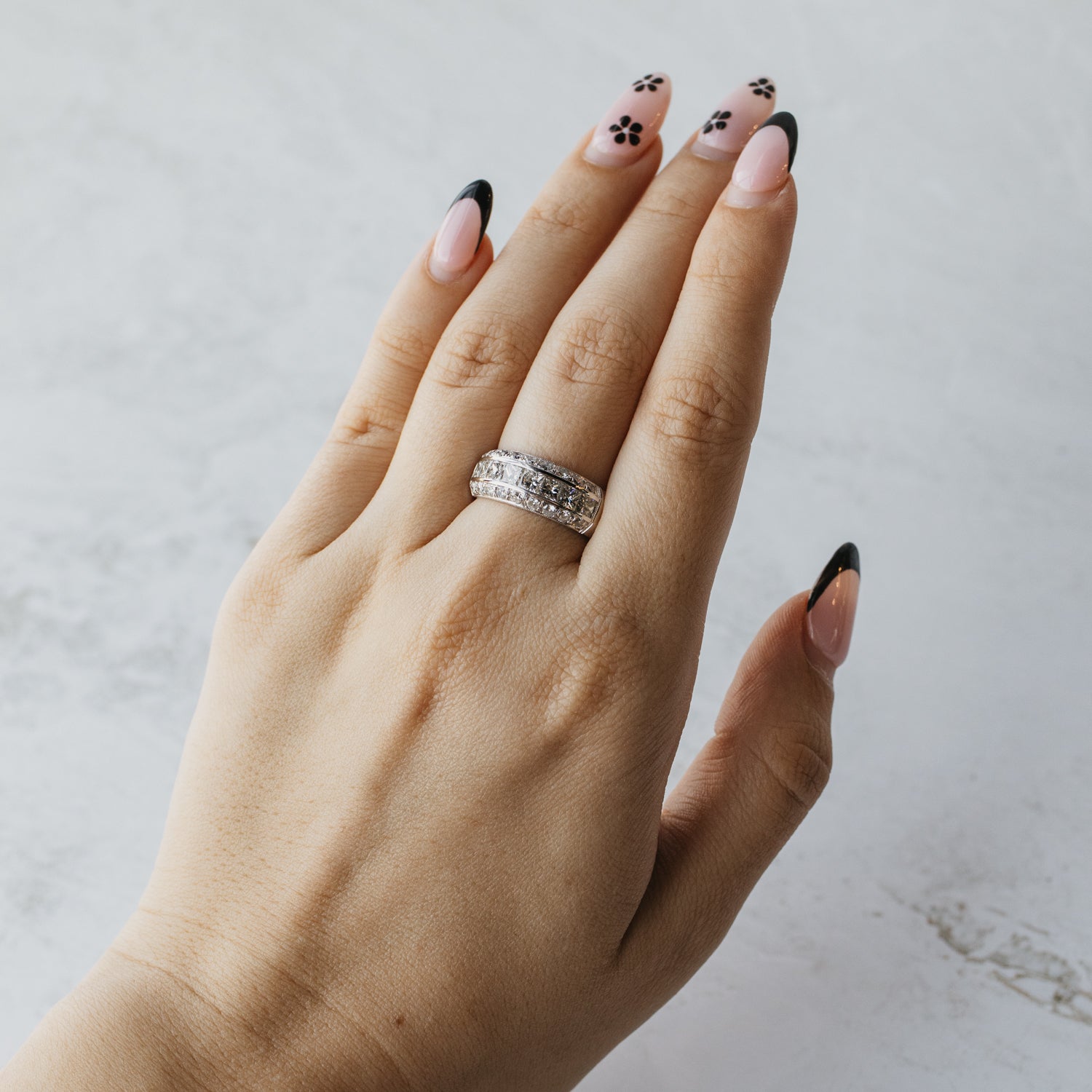 Three-Line Round Brilliant and Princess Cut Diamond Ring