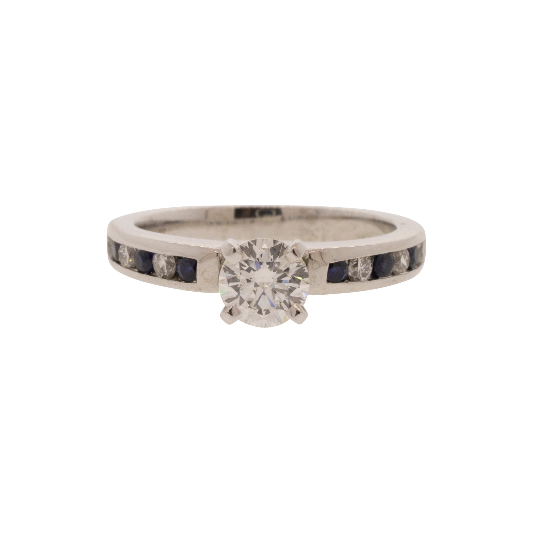 Triple X Round Brilliant Diamond and Sapphire Accented Solitaire Ring