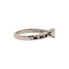 Triple X Round Brilliant Diamond and Sapphire Accented Solitaire Ring