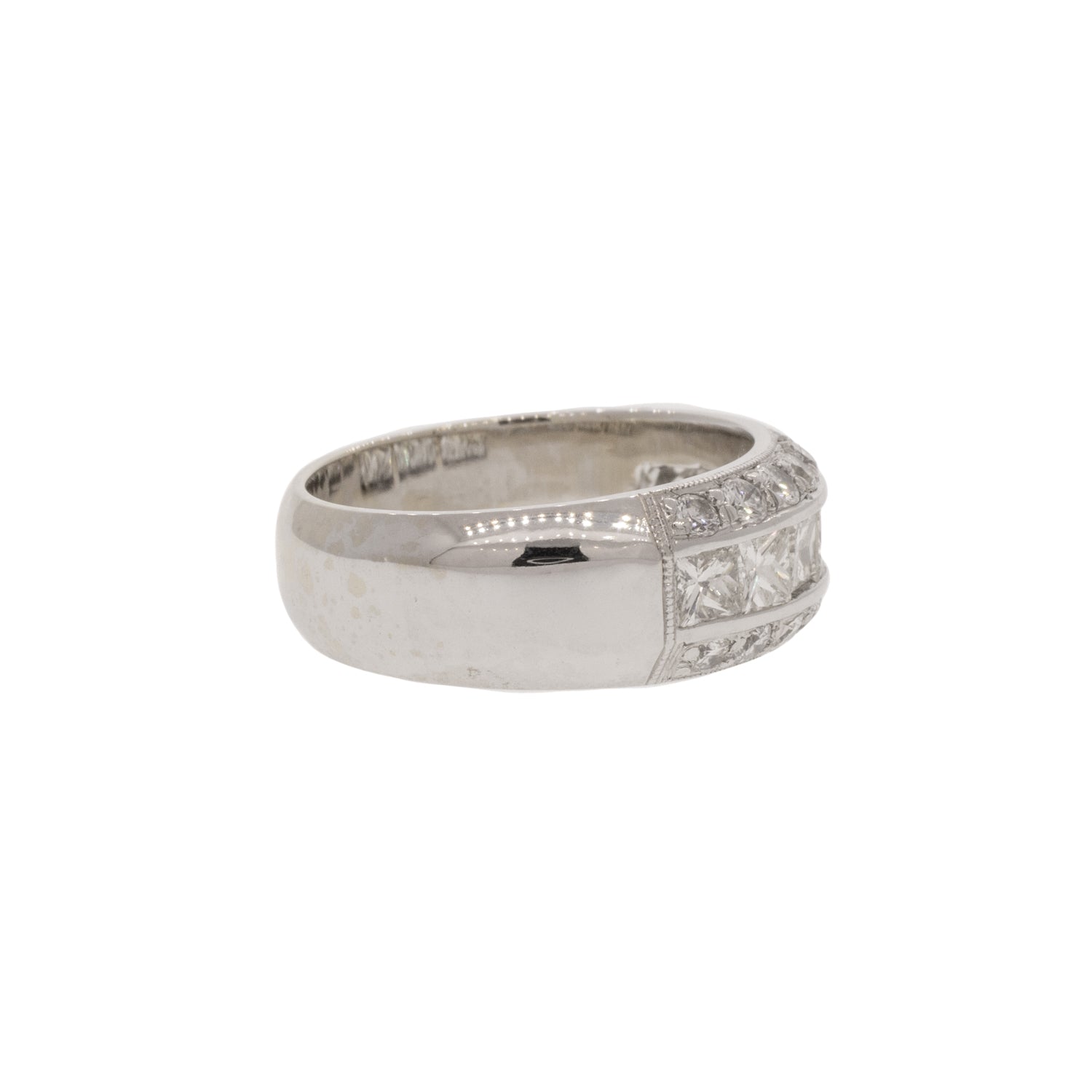 Three-Line Round Brilliant and Princess Cut Diamond Ring