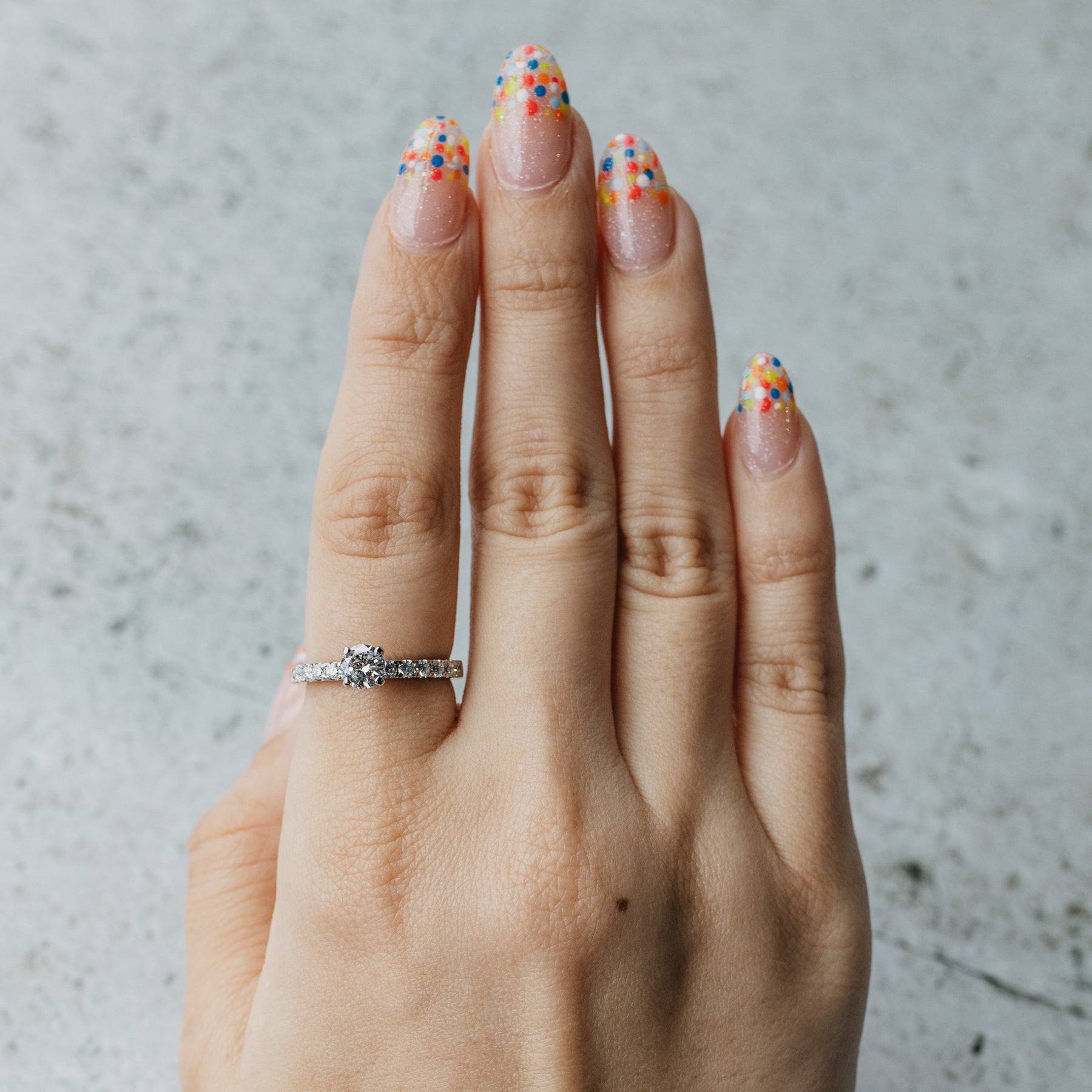 Accented Round Brilliant Cut Diamond Ring