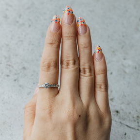 Accented Round Brilliant Cut Diamond Ring