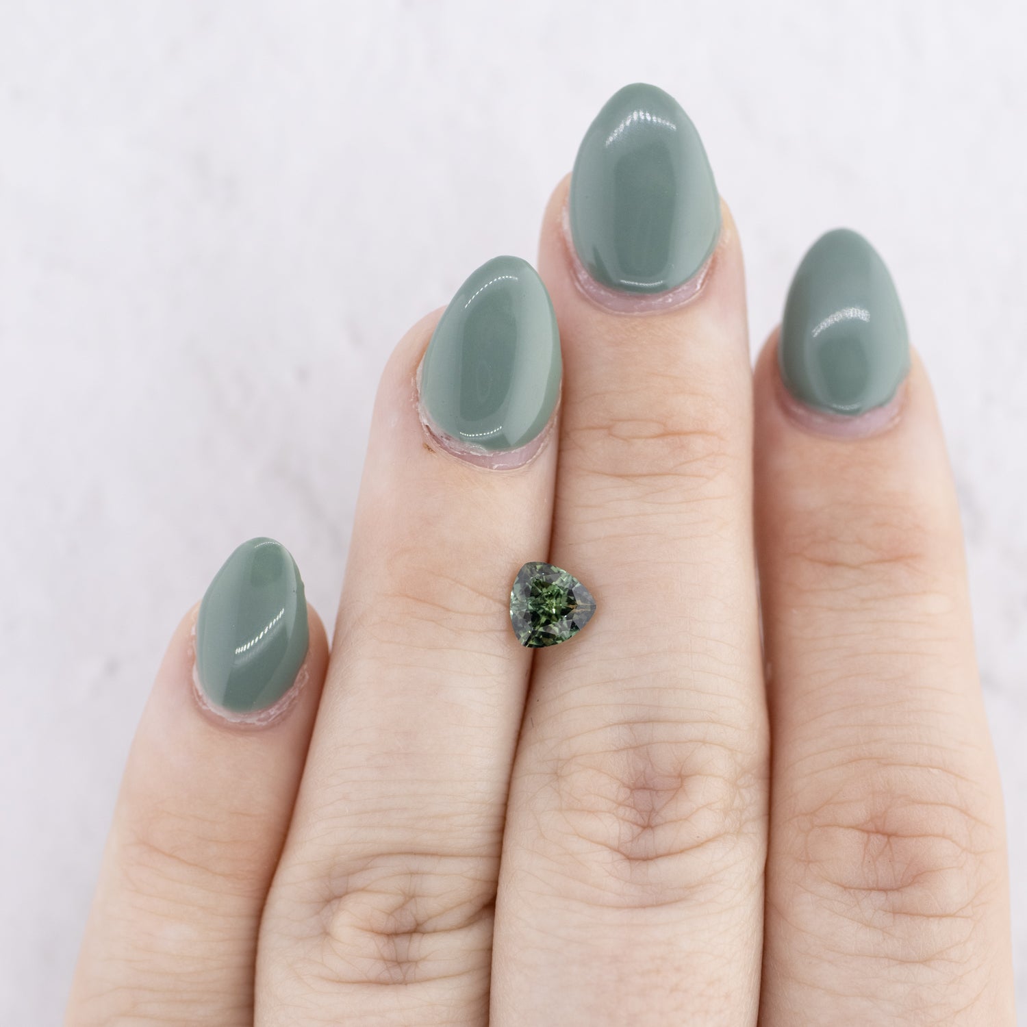 -1.11ct Trillion Cut Natural Teal Sapphire