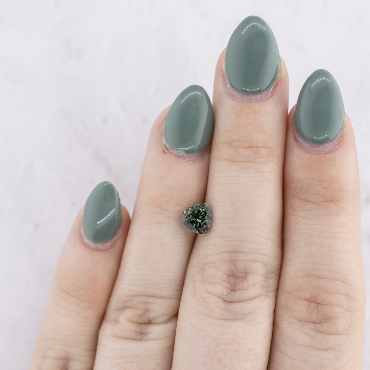 -0.96ct Trillion Cut Natural Teal Sapphire