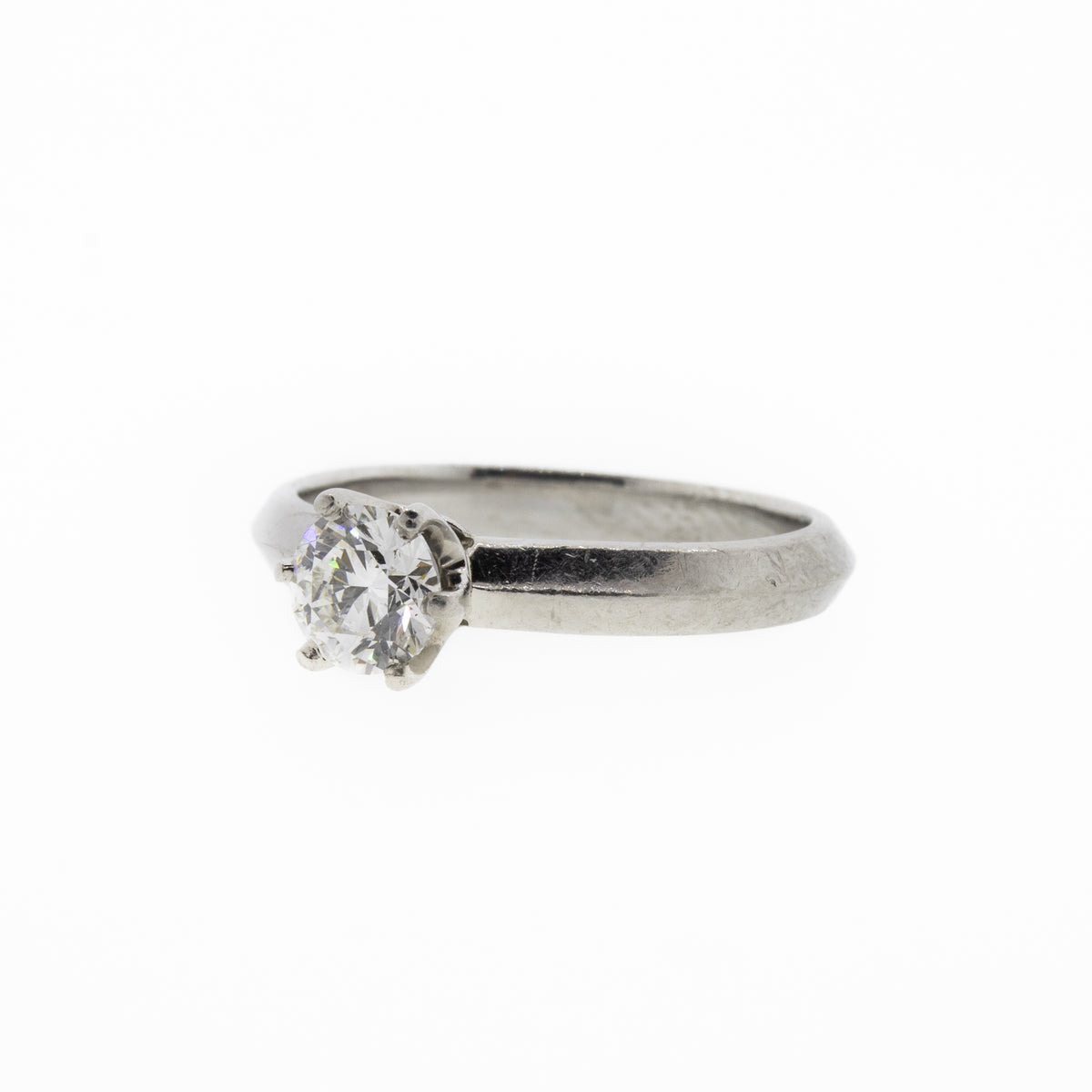 Round Brilliant Diamond and Knife Edge Platinum Ring