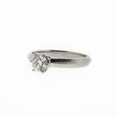 Round Brilliant Diamond and Knife Edge Platinum Ring