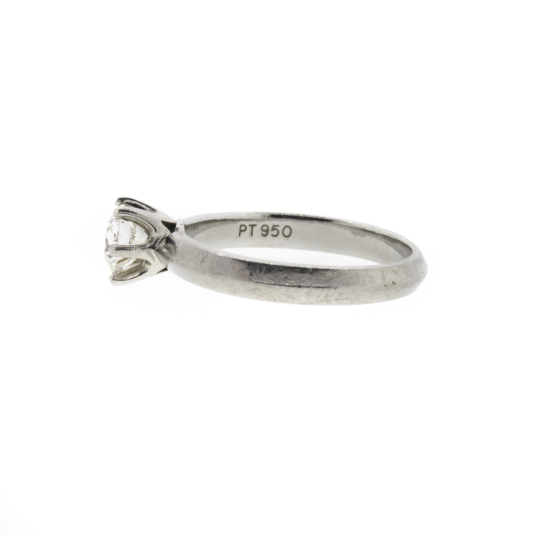 Round Brilliant Diamond and Knife Edge Platinum Ring