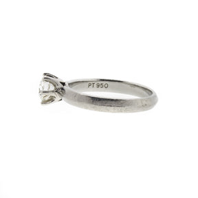 Round Brilliant Diamond and Knife Edge Platinum Ring