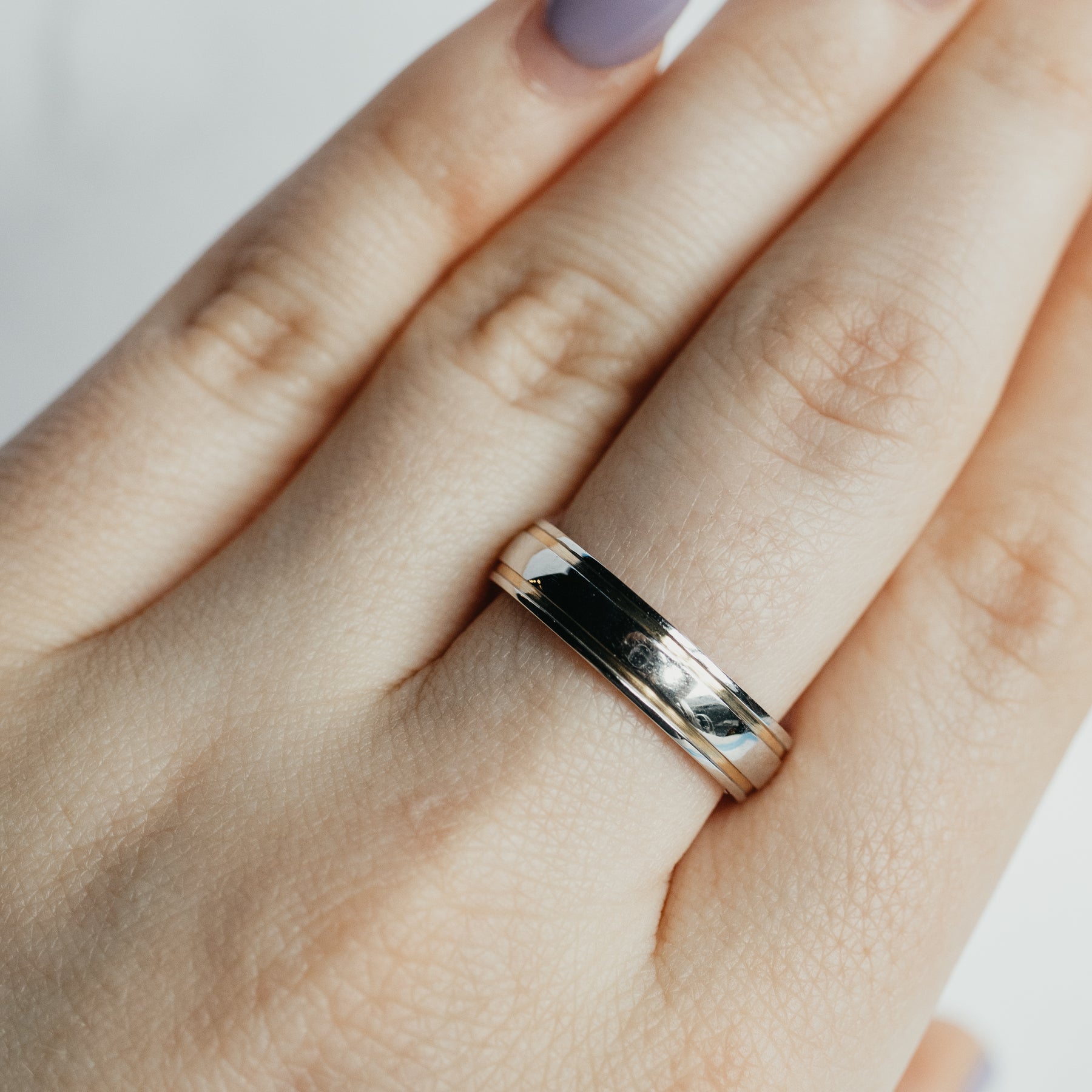 Two-Tone Gold Wedding Band With Hidden Diamond